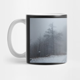 Foggy road in the forest Mug